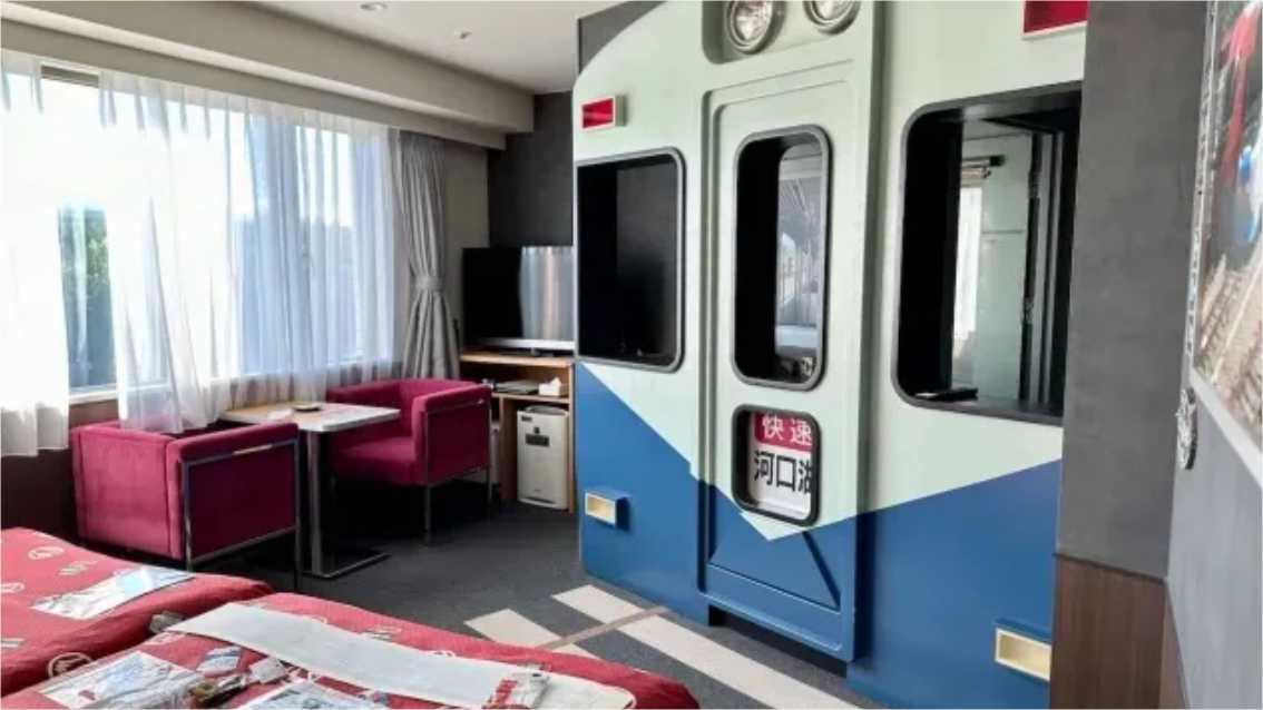 Japanese hotel has a room with a train inside it